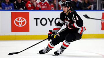 Jan 6, 2025; Buffalo, New York, USA;  Buffalo Sabres center Dylan Cozens (24) looks to take a shot on goal during the second period against the Washington Capitals at KeyBank Center. Mandatory Credit: Timothy T. Ludwig-Imagn Images