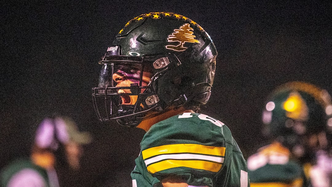 D.C. Everest Evergreen senior defensive back and wide receiver Nevin Poppy (18) cheers as his team secures the ball in the third quarter of the conference game at Stiehm Stadium in Weston, Wis. on Friday, Oct. 11, 2024. D.C. Everest won 47-41.