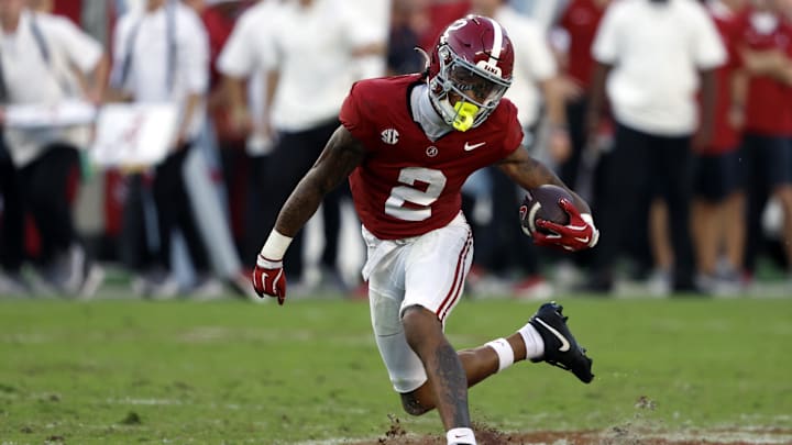 Oct 26, 2024; Tuscaloosa, Alabama, USA;  Alabama Crimson Tide wide receiver Ryan Williams (2) carries the ball after a reception against the Missouri Tigers during the second half at Bryant-Denny Stadium. Mandatory Credit: Butch Dill-Imagn Images