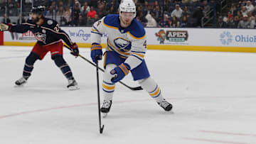 Oct 17, 2024; Columbus, Ohio, USA; Buffalo Sabres defenseman Bowen Byram (4) tracks down a loose puck against the Columbus Blue Jackets during the second period at Nationwide Arena. Mandatory Credit: Russell LaBounty-Imagn Images