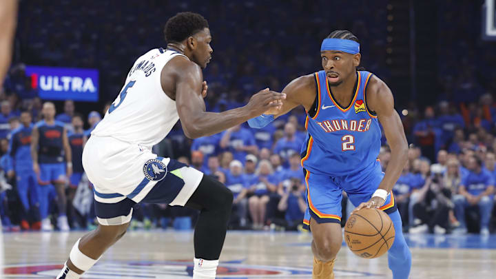Gilgeous-Alexander drives against Edwards during Game 2 of the Western Conference finals. Gilgeous-Alexander drives against Edwards during Game 2 of the Western Conference finals.