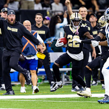 New Orleans Saints wide receiver Rashid Shaheed (22) runs a punt back against the Carolina Panthers