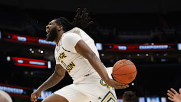Mar 15, 2025; Washington, D.C., USA; George Mason Patriots forward Jalen Haynes (11) celebrates after dinking the ball in the closing seconds against the Saint Joseph's Hawks in the second half at Capital One Arena. Mandatory Credit: Geoff Burke-Imagn Images