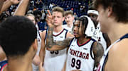 Nov 15, 2024; Spokane, Washington, USA; Gonzaga Bulldogs guard Khalif Battle (99) huddles with the team after a game against the UMass Lowell River Hawks at McCarthey Athletic Center. Mandatory Credit: James Snook-Imagn Images