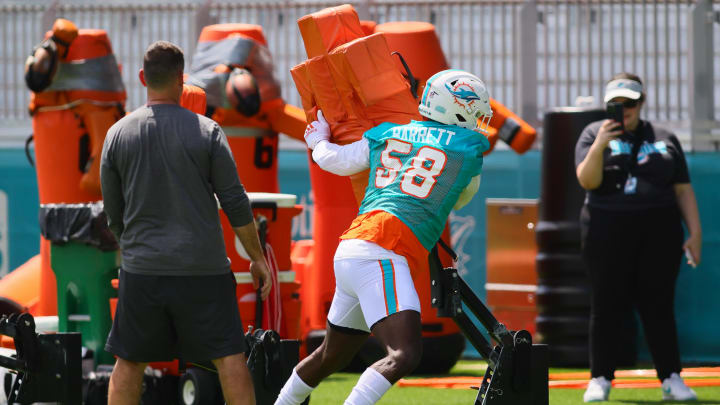 Jun 4, 2024; Miami Gardens, FL, USA; Miami Dolphins linebacker Shaquil Barrett (58) works out during mandatory minicamp at Baptist Health Training Complex. Mandatory Credit: Sam Navarro-USA TODAY Sports