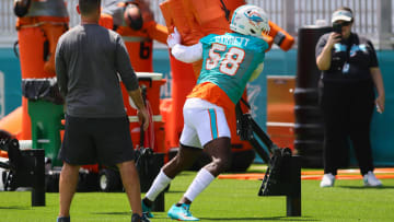 Jun 4, 2024; Miami Gardens, FL, USA; Miami Dolphins linebacker Shaquil Barrett (58) works out during mandatory minicamp at Baptist Health Training Complex.