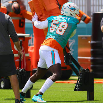 Jun 4, 2024; Miami Gardens, FL, USA; Miami Dolphins linebacker Shaquil Barrett (58) works out during mandatory minicamp at Baptist Health Training Complex.