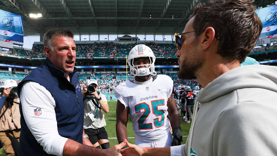 Sep 14, 2025; Miami Gardens, Florida, USA; New England Patriots head coach Mike Vrabel greets former Miami Dolphins head coach Mike McDaniel after a game at Hard Rock Stadium.