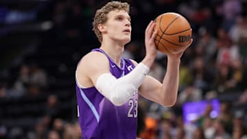 Mar 17, 2025; Salt Lake City, Utah, USA;  Utah Jazz forward Lauri Markkanen (23) shoots a technical free throw during the first quarter against the Chicago Bulls at Delta Center. Mandatory Credit: Chris Nicoll-Imagn Images