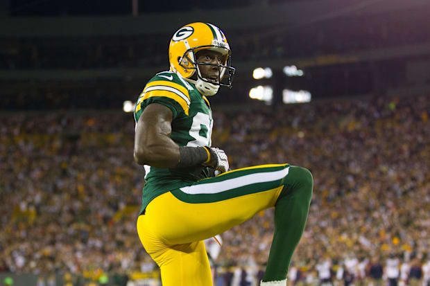 Green Bay Packers wide receiver Donald Driver (80) celebrates a touchdown catch against the Bears in 2012.
