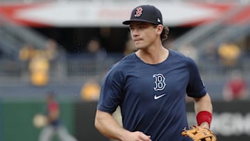 Apr 19, 2024; Pittsburgh, Pennsylvania, USA; Boston Red Sox third baseman Bobby Dalbec (29) jogs off the field before the game against the Pittsburgh Pirates at PNC Park. Mandatory Credit: Charles LeClaire-Imagn Images