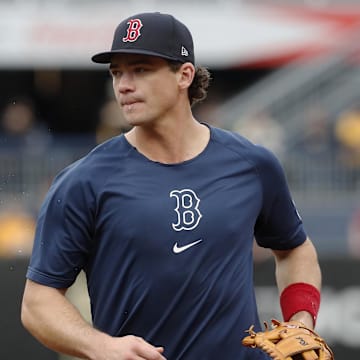 Apr 19, 2024; Pittsburgh, Pennsylvania, USA; Boston Red Sox third baseman Bobby Dalbec (29) jogs off the field before the game against the Pittsburgh Pirates at PNC Park. Mandatory Credit: Charles LeClaire-Imagn Images