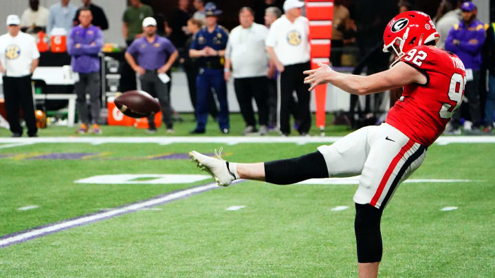 Dec 3, 2022; Atlanta, GA, USA; Georgia Bulldogs punter Brett Thorson (92) punting during the first quarter against the Georgia Bulldogs in the SEC Championship game at Mercedes-Benz Stadium. Mandatory Credit: John David Mercer-USA TODAY Sports