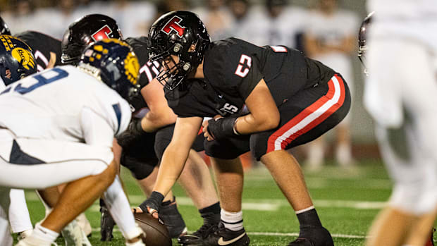 Thurston offensive lineman Parker Edwards lines up to snap the ball as the Thurston Colts host the Bend Lava Bears 