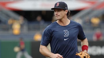 Apr 19, 2024; Pittsburgh, Pennsylvania, USA; Boston Red Sox third baseman Bobby Dalbec (29) jogs off the field before the game against the Pittsburgh Pirates at PNC Park.