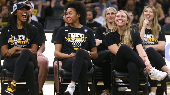 Iowa’s Jada Gyamfi, left, Hannah Stuelke and Sydney Affolter react during a celebration the Iowa women’s basketball team Wednesday, April 10, 2024 at Carver-Hawkeye Arena in Iowa City, Iowa.