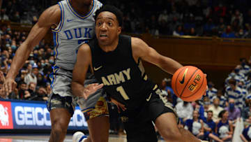 Nov 12, 2021; Durham, North Carolina, USA; Army Black Knights guard Jalen Rucker (1) drives to the basket as Duke Blue Devils guard Jeremy Roach (3) defends during the first half at Cameron Indoor Stadium.