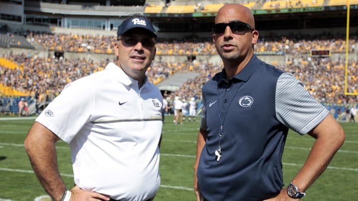 Sep 10, 2016; Pittsburgh, PA, USA;  Pittsburgh Panthers head coach Pat Narduzzi (L) and Penn State Nittany Lions head coach James Franklin (R) talk at mid-field before their teams play at Heinz Field. Mandatory Credit: Charles LeClaire-USA TODAY Sports