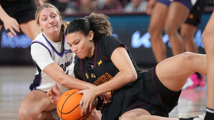ASU Sun Devils forward McKinna Brackens 921) fights for a loose ball with Kansas State Wildcats guard Taryn Sides (11) at Desert Financial Arena in Tempe on Feb. 1, 2026.