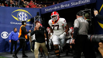 Georgia coach Kirby Smart leads his team onto the field before the start of the SEC Championship game against Alabama at Mercedes-Benz Stadium in Atlanta, on Saturday, Dec. 2, 2023.