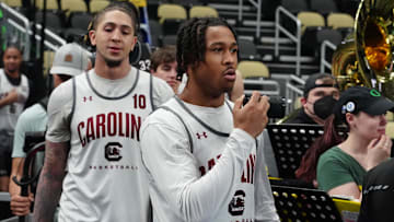 South Carolina Gamecocks guard Meechie Johnson and guard Myles Stute enter the court during the NCAA first round practice session at PPG Paints Arena. 