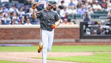 May 25, 2024; New York City, New York, USA;  New York Mets first baseman Pete Alonso (20) throws his bat after flying out to end the seventh inning against the San Francisco Giants at Citi Field. Mandatory Credit: Wendell Cruz-Imagn Images