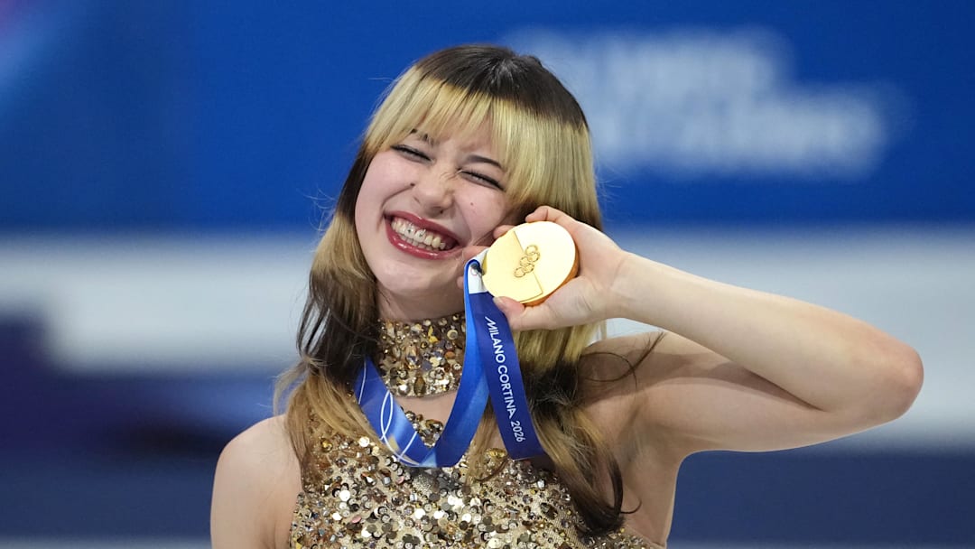 Milan, Italy; Alysa Liu of the United States celebrates with the gold medal in the women's free skate during the Milano Cortina 2026 Olympic Winter Games at Milano Ice Skating Arena. 
