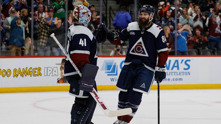 Dec 13, 2025; Denver, Colorado, USA; Colorado Avalanche defenseman Brent Burns (84) celebrates with goaltender Scott Wedgewood (41) after the game against the Nashville Predators at Ball Arena. Mandatory Credit: Isaiah J. Downing-Imagn Images