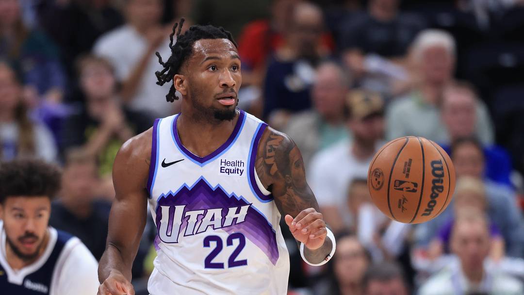 Oct 6, 2026; Salt Lake City, Utah, USA;  Utah Jazz guard Darryn Peterson (22) brings the ball up the court against the Denver Nuggets during the second quarter at Delta Center.  Mandatory Credit: Rob Gray-Imagn Images