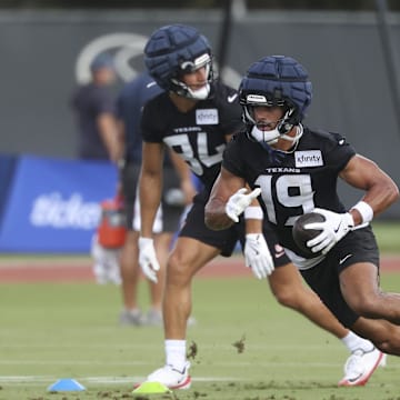 Jul 23, 2025; Houston, TX, USA;  Houston Texans wide receiver Xavier Hutchinson (19) during training camp at Houston Methodist Training Center. Mandatory Credit: Troy Taormina-Imagn Images