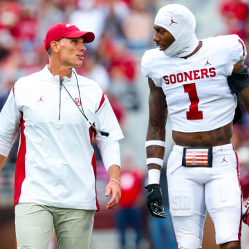 Apr 20, 2024; Norman, OK, USA; Oklahoma Sooners head coach Brent Venables speaks with Oklahoma Sooners linebacker Dasan McCullough (1) during the Oklahoma Sooners spring game at Gaylord Family OK Memorial Stadium. Mandatory Credit: Kevin Jairaj-USA TODAY Sports