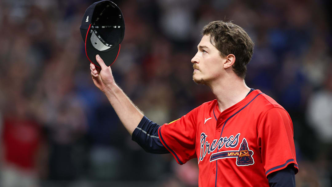 Former Atlanta Braves starting pitcher Max Fried (54) tips his hat to the crowd after being removed from a game against the Kansas City Royals in the ninth inning at Truist Park. 