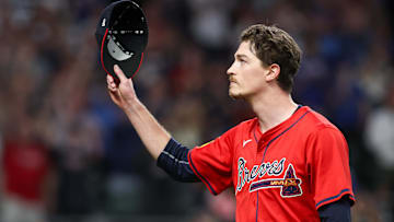 Former Atlanta Braves starting pitcher Max Fried (54) tips his hat to the crowd after being removed from a game against the Kansas City Royals in the ninth inning at Truist Park. 