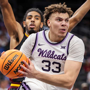 Mar 11, 2025; Kansas City, MO, USA; Kansas State Wildcats guard Coleman Hawkins (33) drives to the basket during the first half against the Arizona State Sun Devils at T-Mobile Center. 