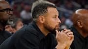 Oct 30, 2024; San Francisco, California, USA; Golden State Warriors guard Stephen Curry (30) sits on the bench injured during the second quarter against the New Orleans Pelicans at Chase Center. Mandatory Credit: David Gonzales-Imagn Images