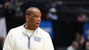 Mar 17, 2025; Dayton, OH, USA; North Carolina Tar Heels head coach Hubert Davis coaches during the First Four Practice at UD Arena. Mandatory Credit: Rick Osentoski-Imagn Images