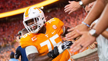 Tennessee offensive lineman Jerome Carvin (75) high fives fans during the Vols' game against Ball State in Neyland Stadium on Thursday, Sept. 1, 2022.

Kns Vols Ball State Bp