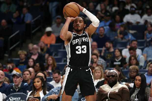 San Antonio Spurs guard Tre Jones (33) shoots for three during the second half against the Memphis Grizzlies at FedExForum. 