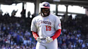 Sep 7, 2025; Chicago, Illinois, USA; Washington Nationals pinch-hitter Josh Bell (19) gestures after hitting a three-run home run against the Chicago Cubs during the ninth inning at Wrigley Field. 