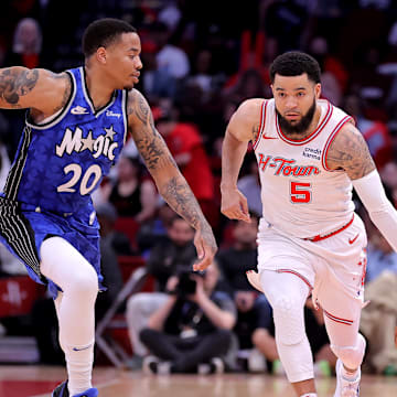 Apr 9, 2024; Houston, Texas, USA; Houston Rockets guard Fred VanVleet (5) handles the ball against Orlando Magic guard Markelle Fultz (20) during the first quarter at Toyota Center. Mandatory Credit: Erik Williams-Imagn Images