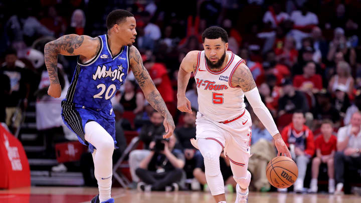 Apr 9, 2024; Houston, Texas, USA; Houston Rockets guard Fred VanVleet (5) handles the ball against Orlando Magic guard Markelle Fultz (20) during the first quarter at Toyota Center. Mandatory Credit: Erik Williams-USA TODAY Sports