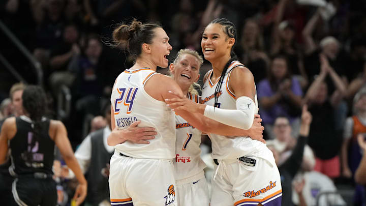 Jun 5, 2025; Phoenix, Arizona, USA; Phoenix Mercury forward Kathryn Westbeld (24), guard Lexi Held (1), and forward Satou Sabally (0) celebrate after defeating the Golden State Valkyries in the second half at Footprint Center. Mandatory Credit: Rick Scuteri-Imagn Images