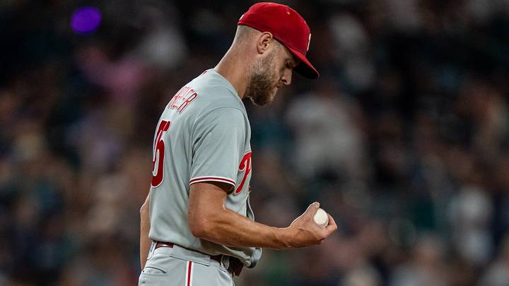 Aug 24, 2026; Seattle, Washington, USA;  Philadelphia Phillies starting pitcher Zack Wheeler (45) reacts after giving up a home run during the fifth inning against the Seattle Mariners at T-Mobile Park. Mandatory Credit: Stephen Brashear-Imagn Images