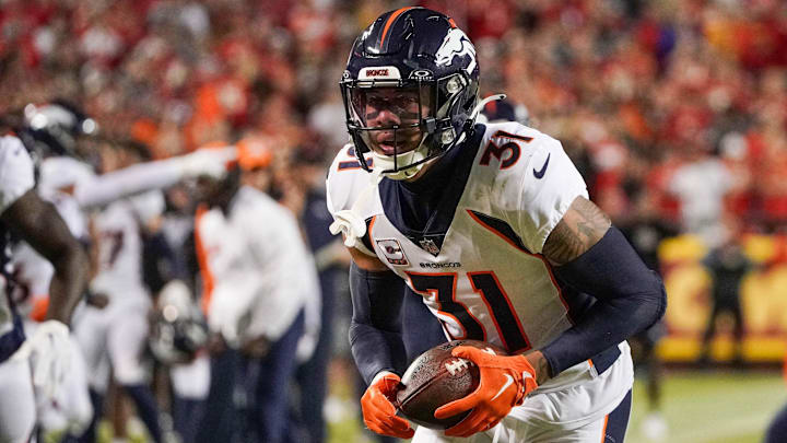 Oct 12, 2023; Kansas City, Missouri, USA; Denver Broncos safety Justin Simmons (31) runs the ball against the Kansas City Chiefs during the game at GEHA Field at Arrowhead Stadium. 