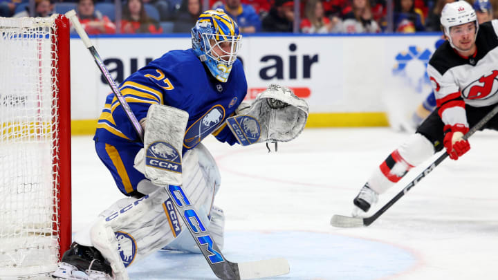 Mar 29, 2024; Buffalo, New York, USA;  Buffalo Sabres goaltender Devon Levi (27) looks for the puck during the third period against the New Jersey Devils at KeyBank Center. Mandatory Credit: Timothy T. Ludwig-USA TODAY Sports