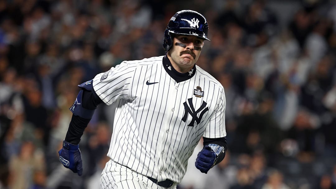 Oct 29, 2024; Bronx, New York, USA; New York Yankees catcher Austin Wells (28) reacts after hitting a home run against the Los Angeles Dodgers in the sixth inning during game four of the 2024 MLB World Series at Yankee Stadium.