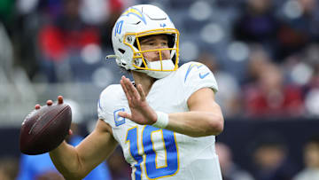 Chargers' quarterback Justin Herbert looks to throw during the 2024 AFC Wild Card Playoffs against the Houston Texans.