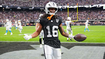 Jan 5, 2025; Paradise, Nevada, USA; Las Vegas Raiders wide receiver Jakobi Meyers (16) celebrates after scoring a touchdown against the Los Angeles Chargers during the second quarter at Allegiant Stadium. Mandatory Credit: Stephen R. Sylvanie-Imagn Images