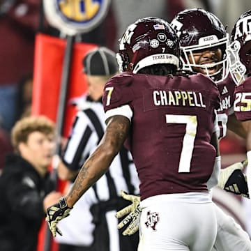 Nov 11, 2023; College Station, Texas, USA; Texas A&M Aggies defensive lineman Fadil Diggs (10), defensive back Tyreek Chappell (7) and Texas A&M Aggies defensive back Dalton Brooks (25) react during the game against the Mississippi State Bulldogs at Kyle Field. 