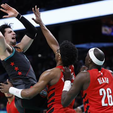 Apr 5, 2024; Washington, District of Columbia, USA; Washington Wizards forward Deni Avdija (8) drives to the basket as Portland Trail Blazers guard Scoot Henderson (00) defends in the second half at Capital One Arena. Mandatory Credit: Geoff Burke-Imagn Images